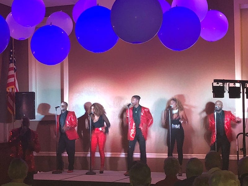 Group performing a song at The Terraces at Bonita Springs