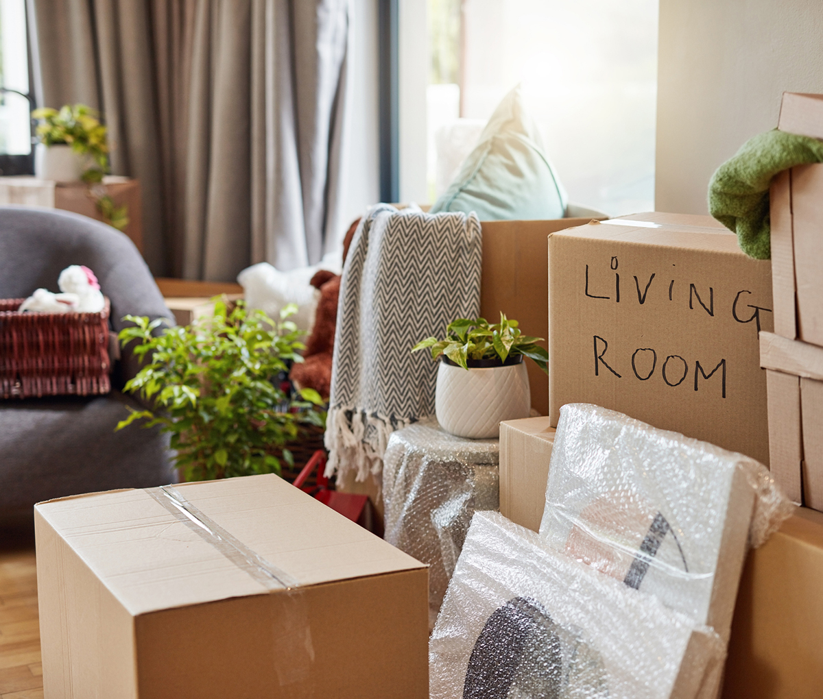 Shot of a room full of boxes waiting to be unpacked on moving day