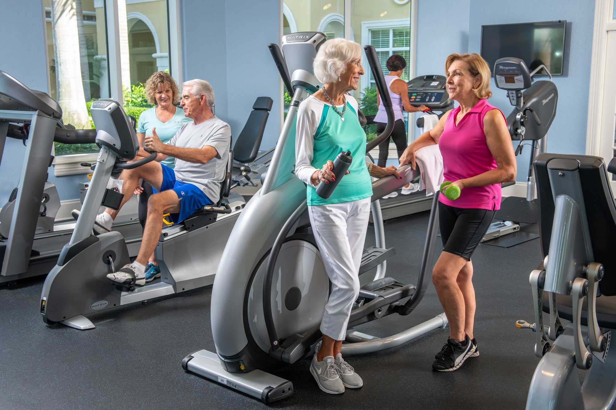 a group of seniors working out at the gym